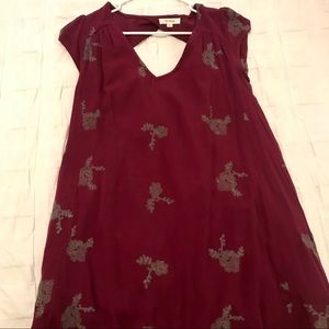 Burgundy v-neck dress with floral detailing